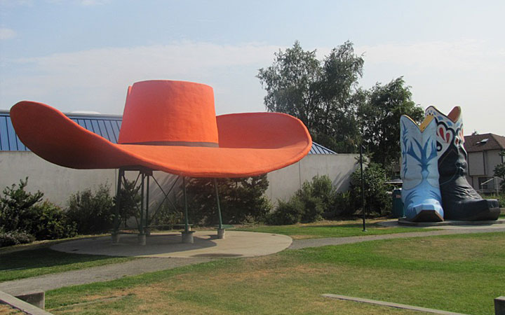 Oxbow Park is located in the heart of historic Georgetown. In 1953, Seattle artist Lewis Nasmyth was hired to "rustle up" a design for a western-style gas station in Georgetown. Featuring a 44-ft. wide cowboy hat and 22-ft. high boots, the Hat n' Boots opened the next year to a stampede of customers. In fact, for a time it was the biggest selling station in the state. Legend has it even Elvis dropped by when he was in town during the World's Fair in '62. But in the early 60's, a brand new interstate, I-5, started diverting traffic away from the station. By the late 80's it pretty much looked like trail's end for the Hat n' Boots. That's when some Georgetown residents saddled up to rescue the soul of their community. "The Hat n' Boots is as important to Georgetown as the Golden Gate Bridge is to San Francisco," says Allan Phillips, former director of the Georgetown Community Council. "If the Hat n' Boots were ever to be gone from Georgetown, it would be like losing our soul."